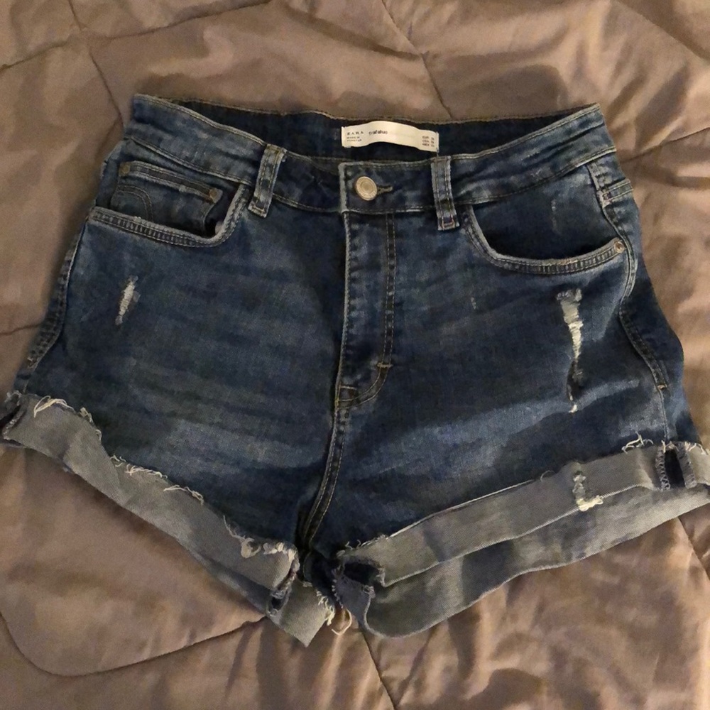 Distressed denim shorts